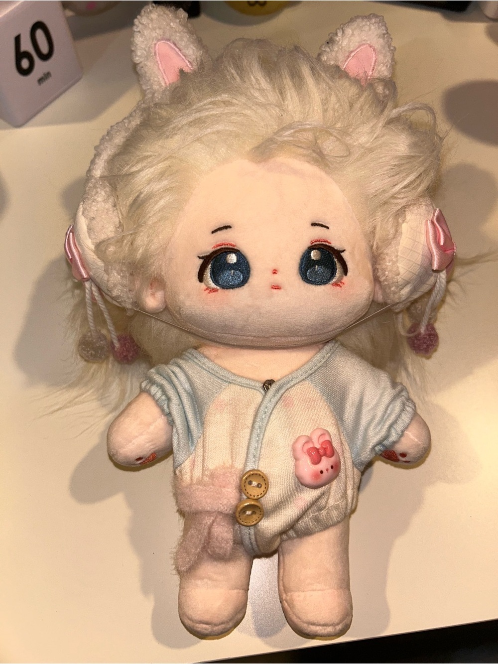 Calembou Adorable Plush Doll with Blue Eyes and Pink Accents